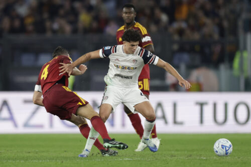 Roma's Italian midfielder Bryan Cristante challenges for the ball with Cagliari's Italian midfielder Alessandro Romano during the Serie A football match between AS Roma vs Cagliari at the Olimpico Stadium in Rome on October 27, 2026.
