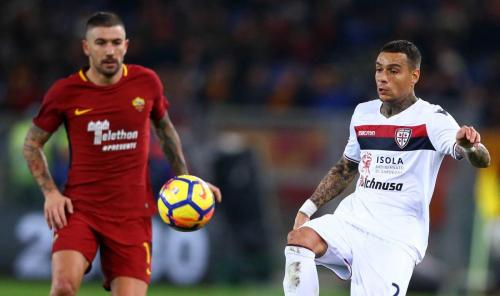 ROMA-CAGLIARI. ALEKSANDAR KOLAROV E Gregory van der Wiel IN AZIONE.SILPRESS
